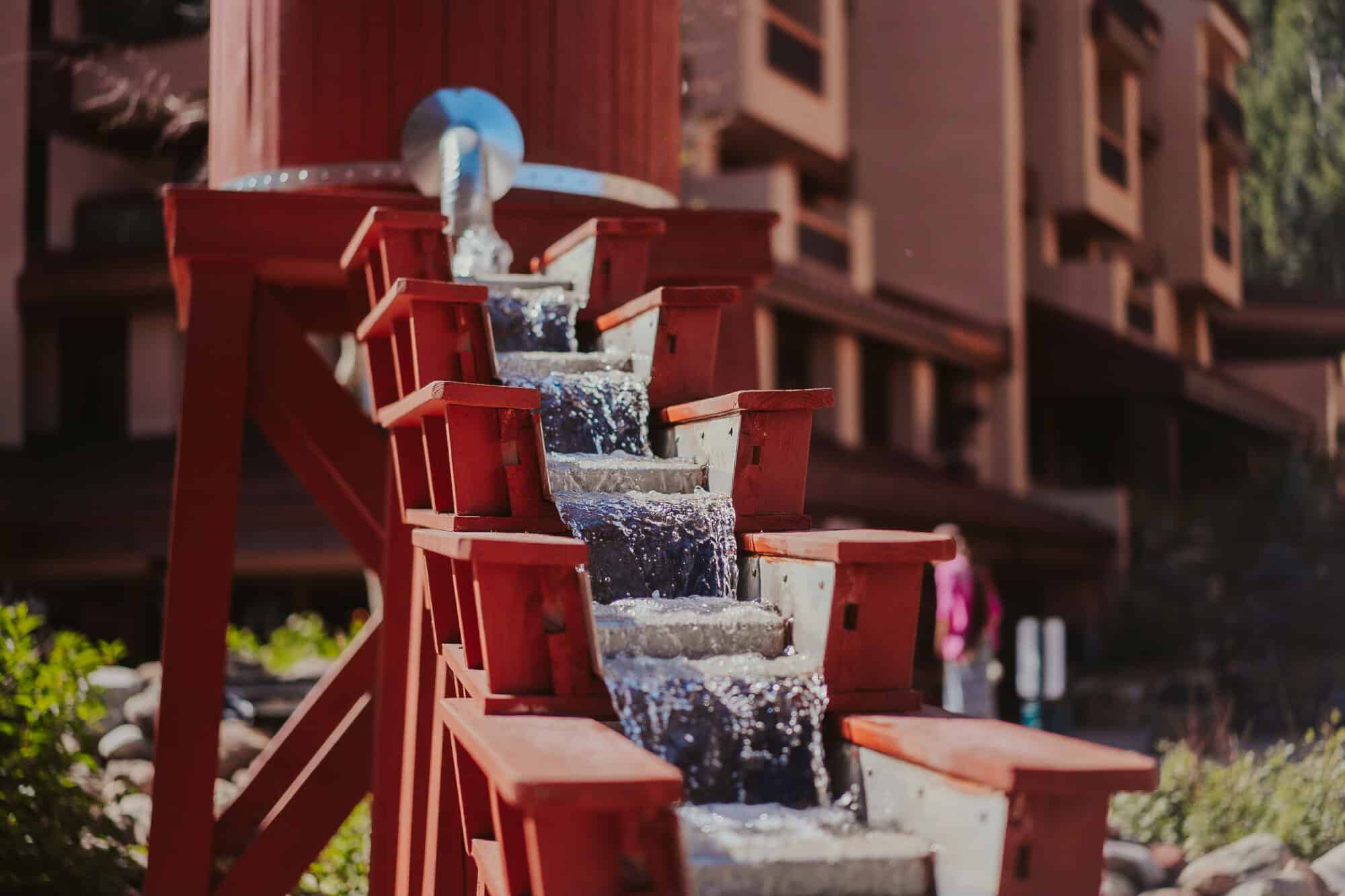 Water flows down from the water tower into the mining trough