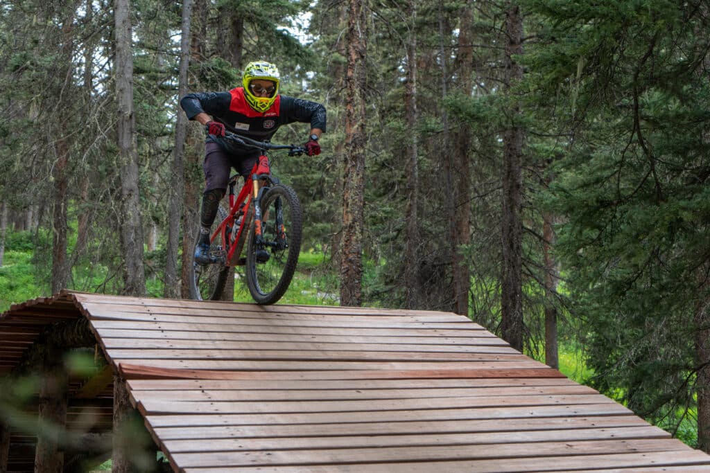 Instructor Dave riding a feature in the Purg Bike Park