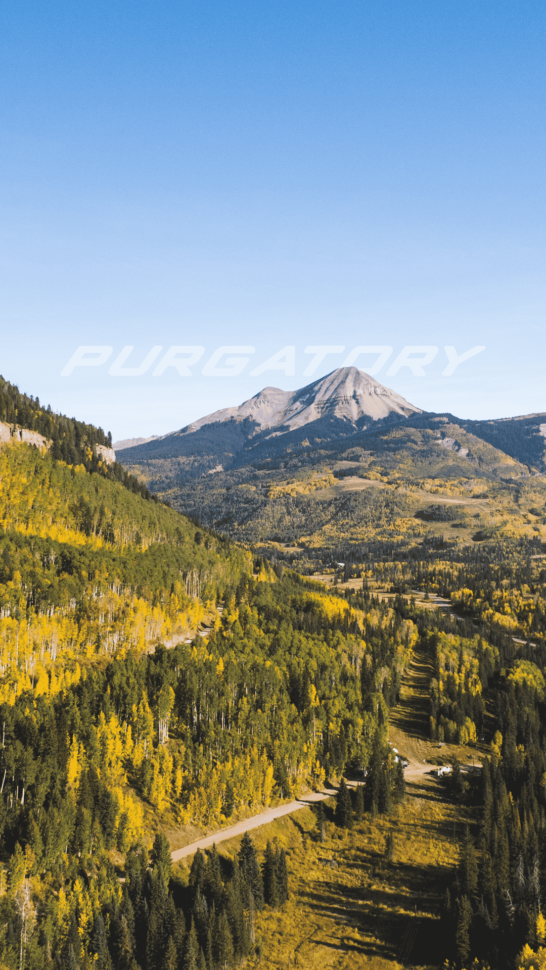 Golden aspens dot the mountain hillsides in a scenic phone background