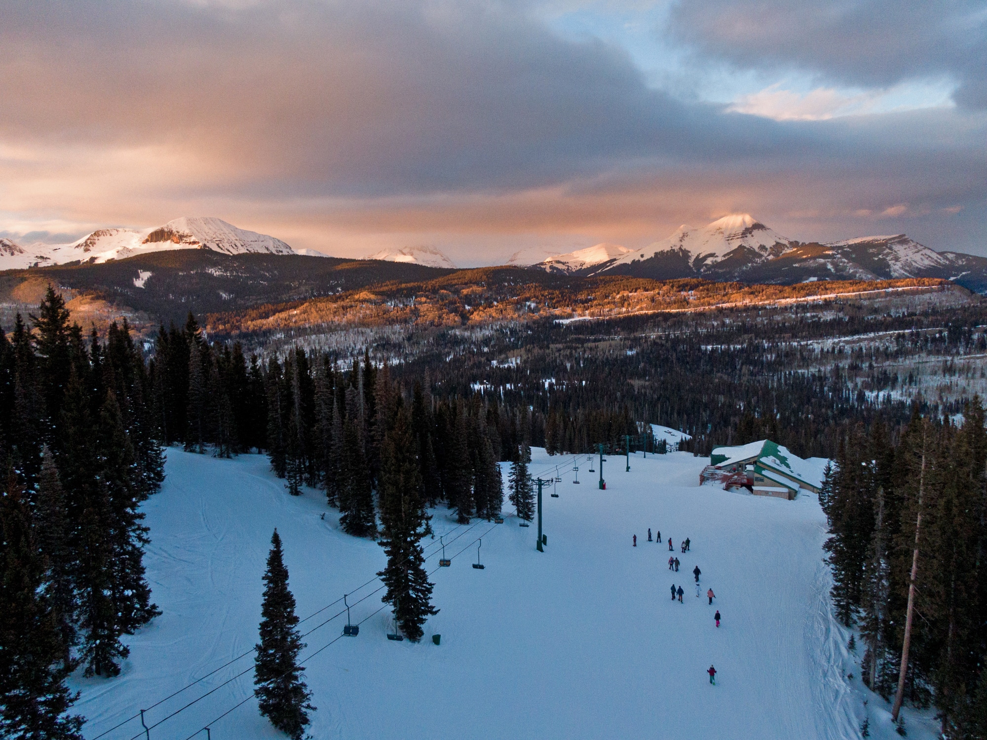 As the sunsets during a snowshoe tour, guest are treated to the unbelievable beauty of the San Juan Mountains