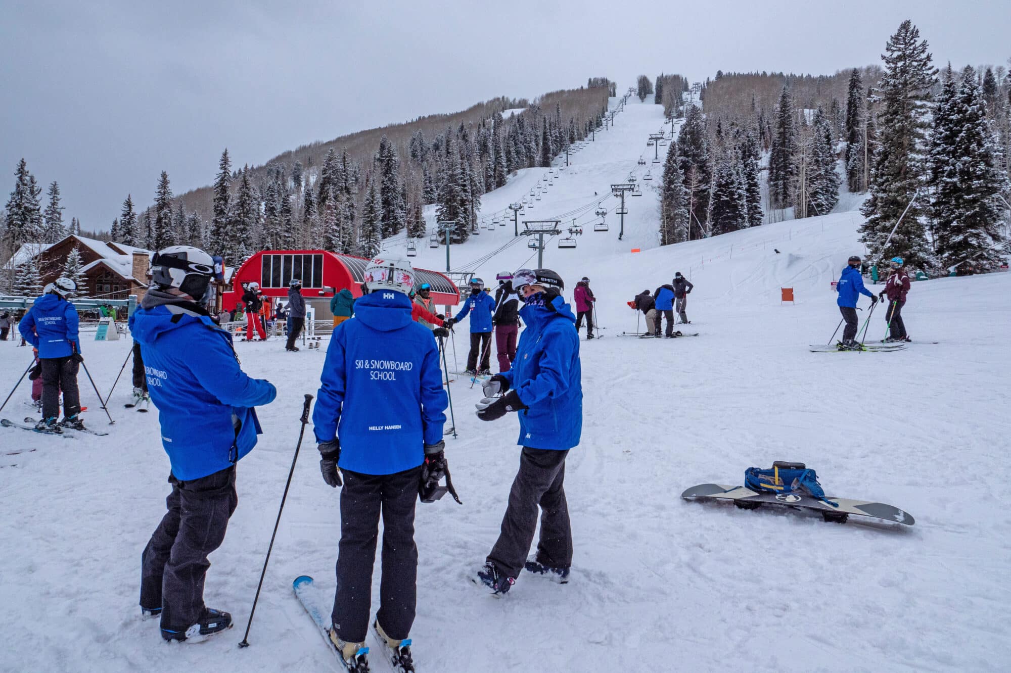 Adult group lessons meet at the beach area of Purgatory Resort