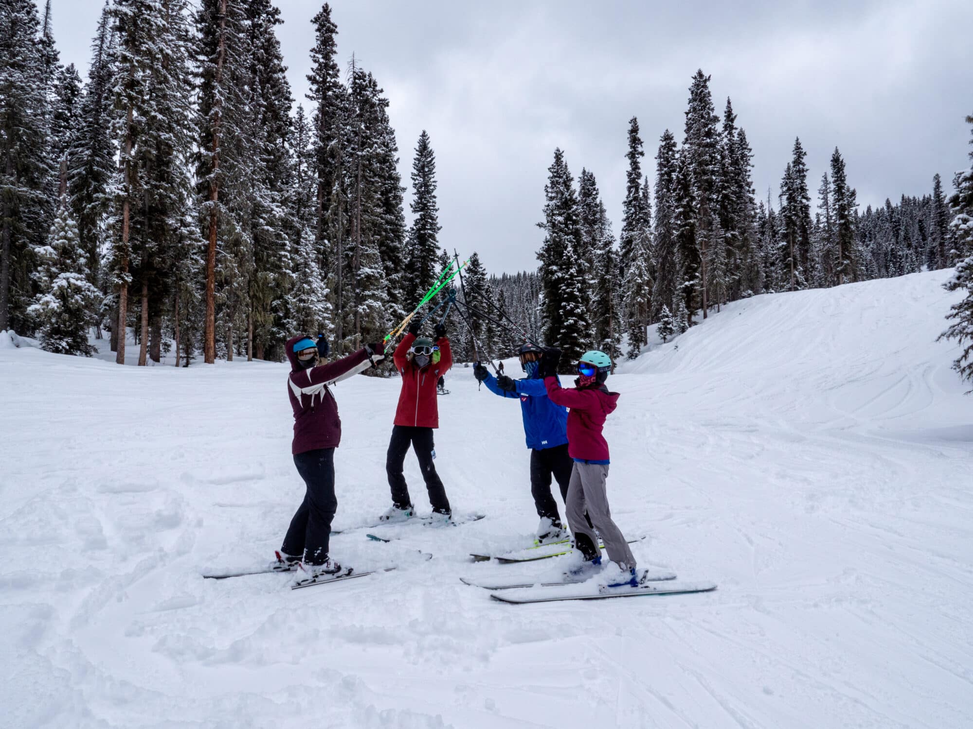 Women's ski clinic celebrates a great powder day on the mountain