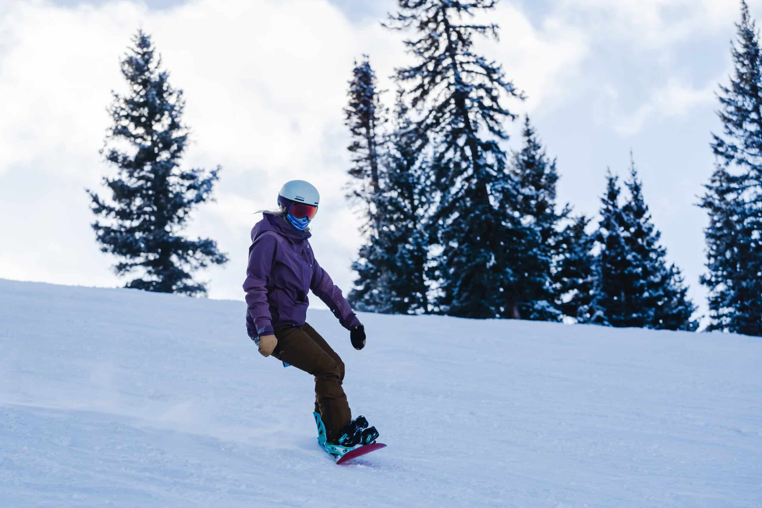 Woman snowboarding