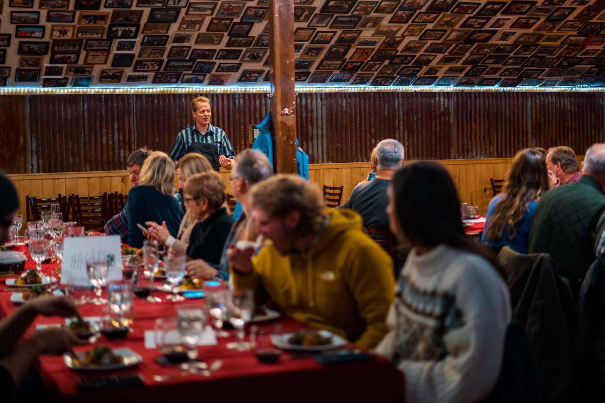 Chef explains the menu to guest at Powderhouse