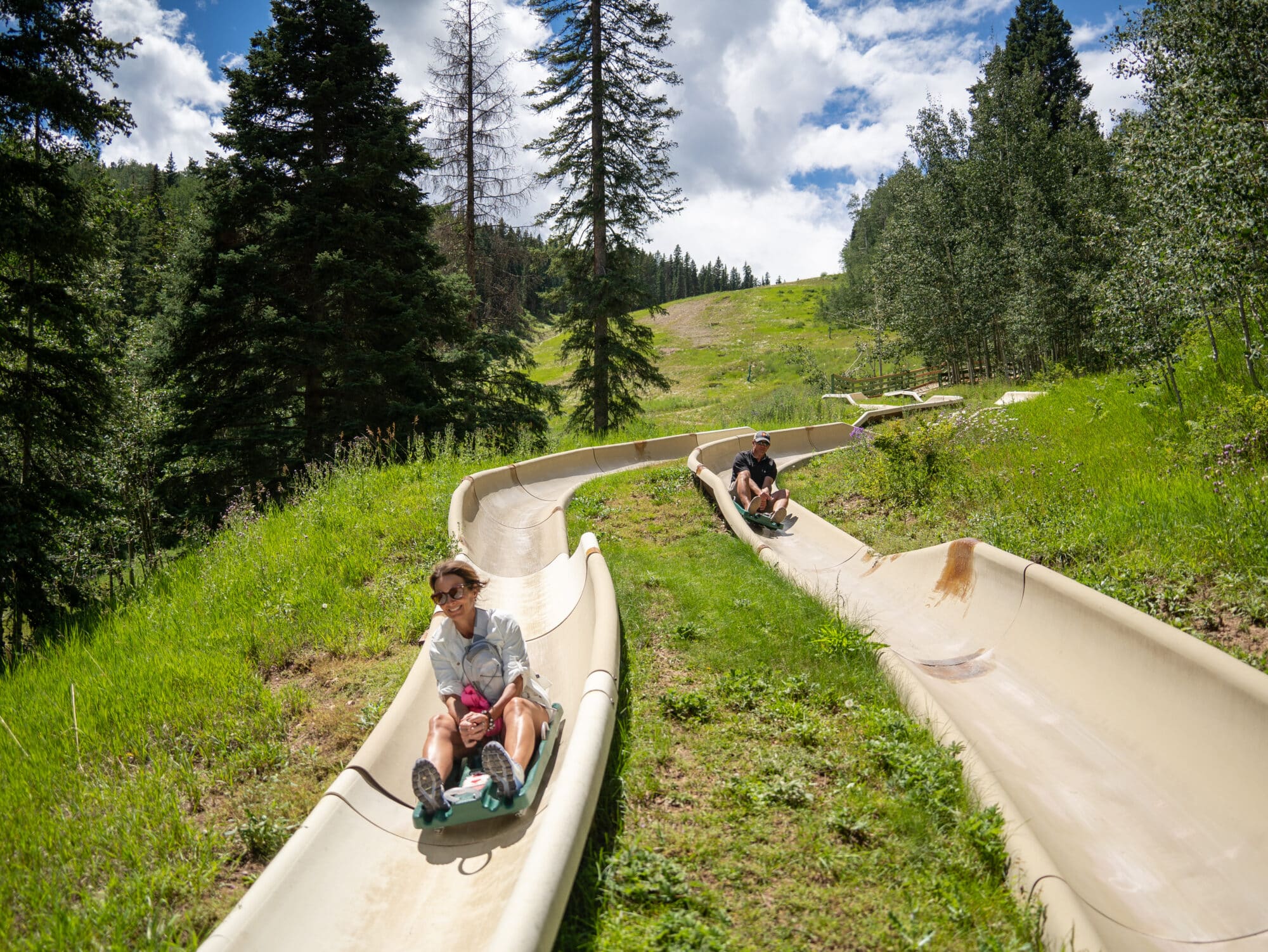 two rider races down the alpine slide