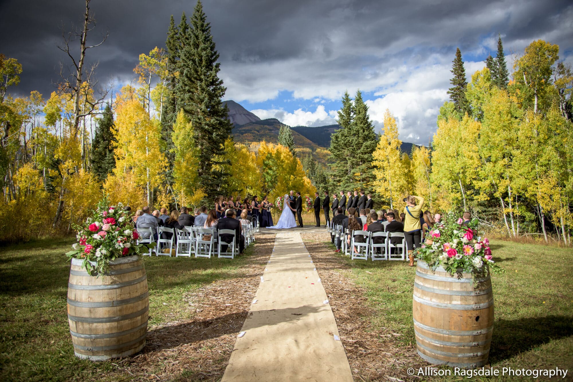 Wedding ceremony in the fall colored aspens at the Engineer ceremony site