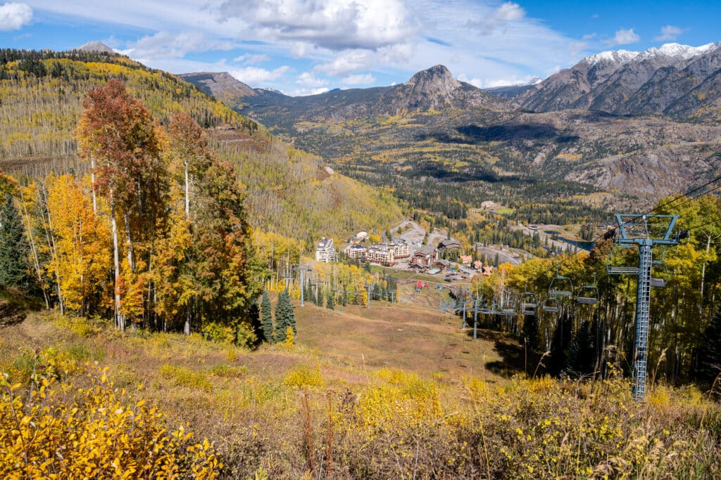 Peak fall colors cover the mountain looking down on Purgatory's base area