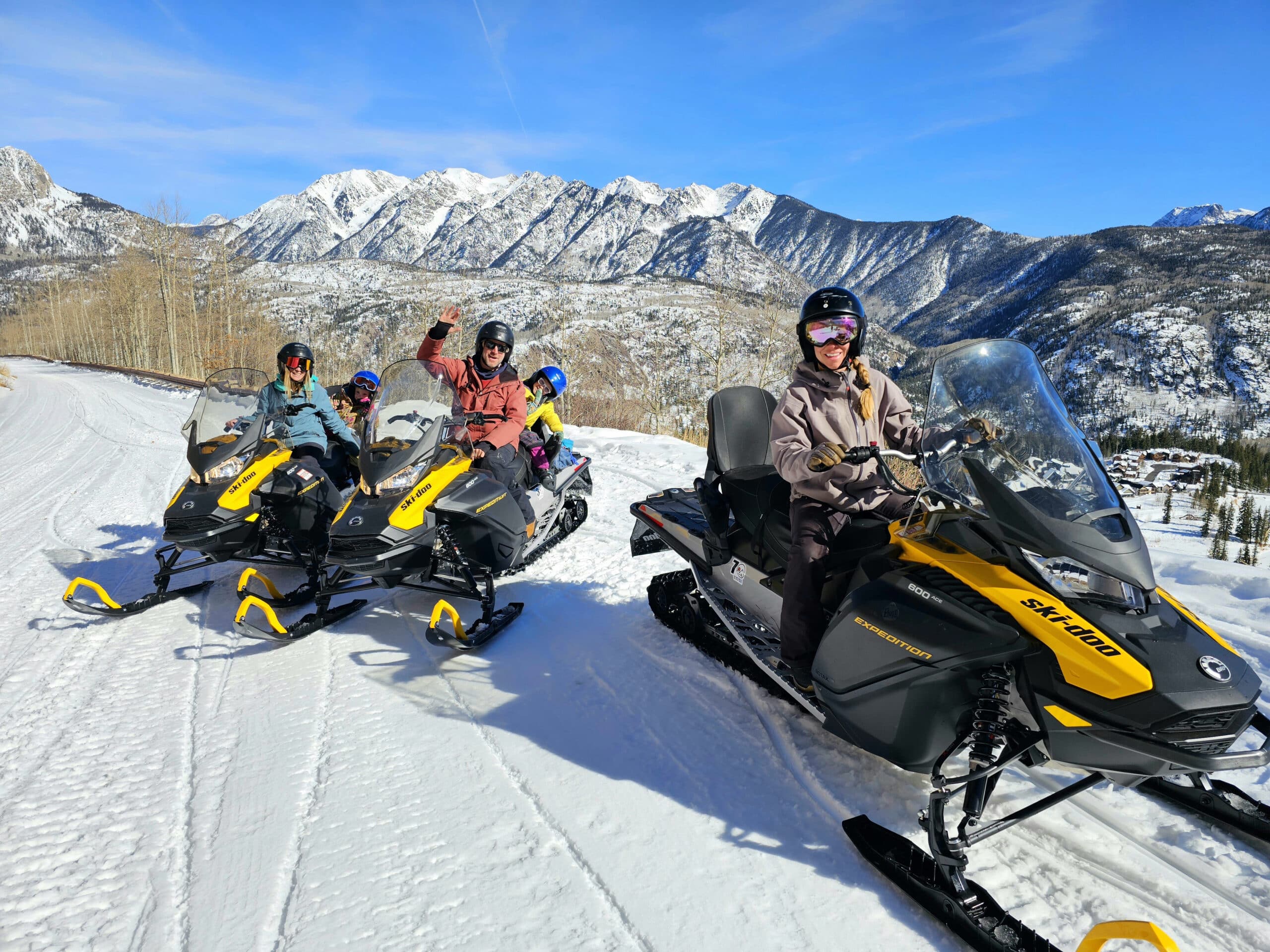 Group of snowmobilers enjoy a tour at Purgatory Resort through Snowmobile Adventures