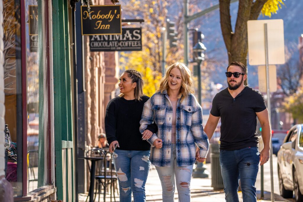 Window shopping on Main Avenue in Downtown Durango, Colorado during autumn