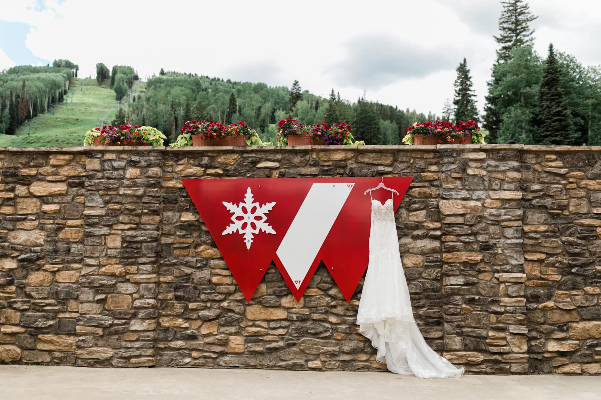 Wedding dress adorns the Purgatory logo in the base area