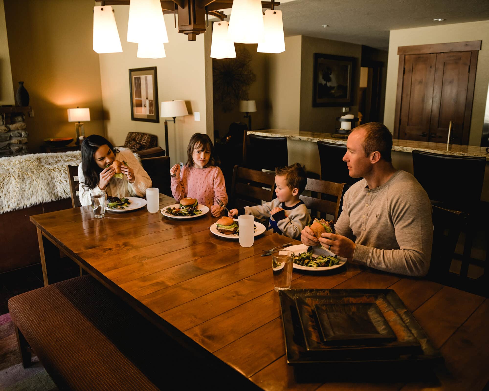 Family eating dinner in condo