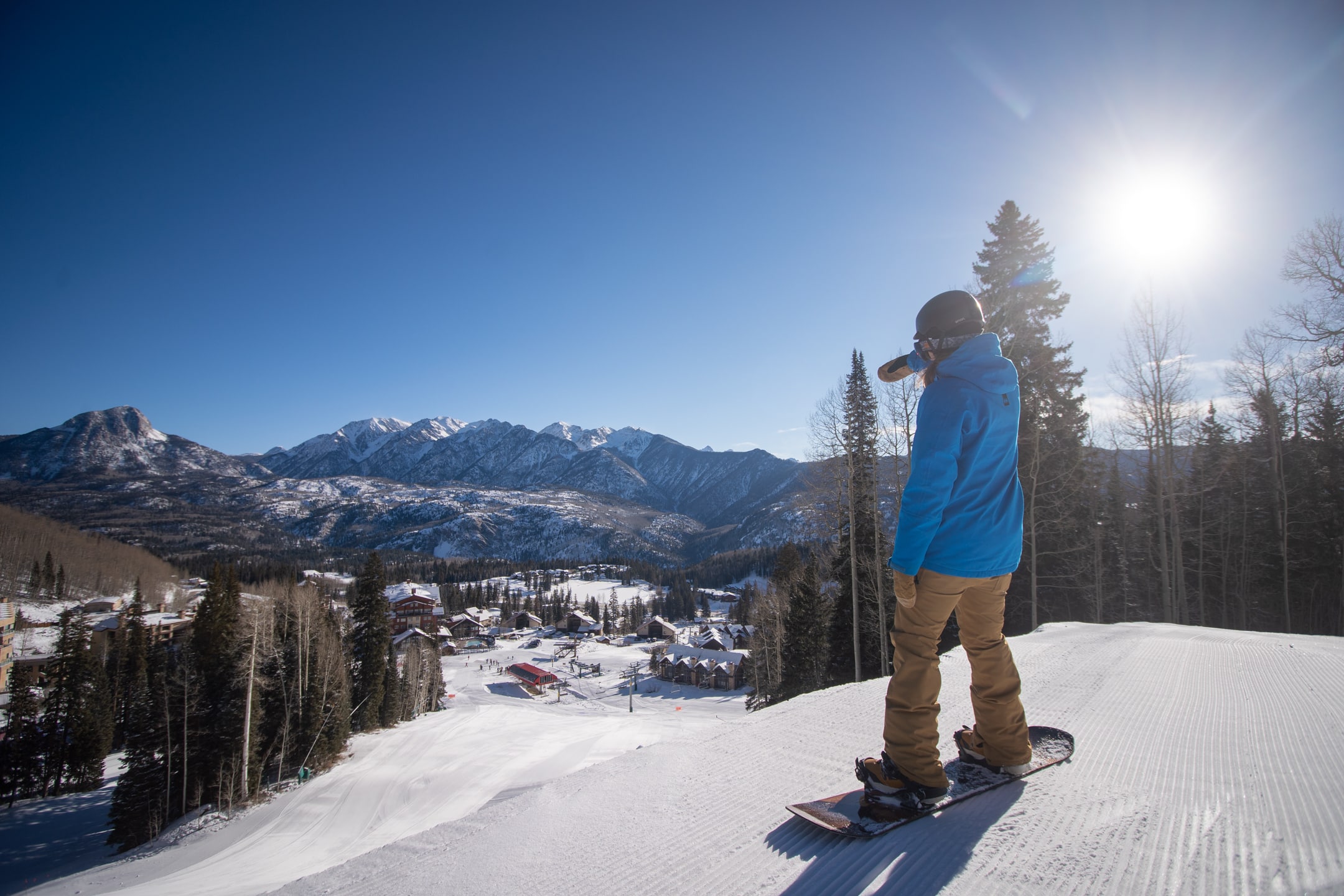 Snowboarder dropping in