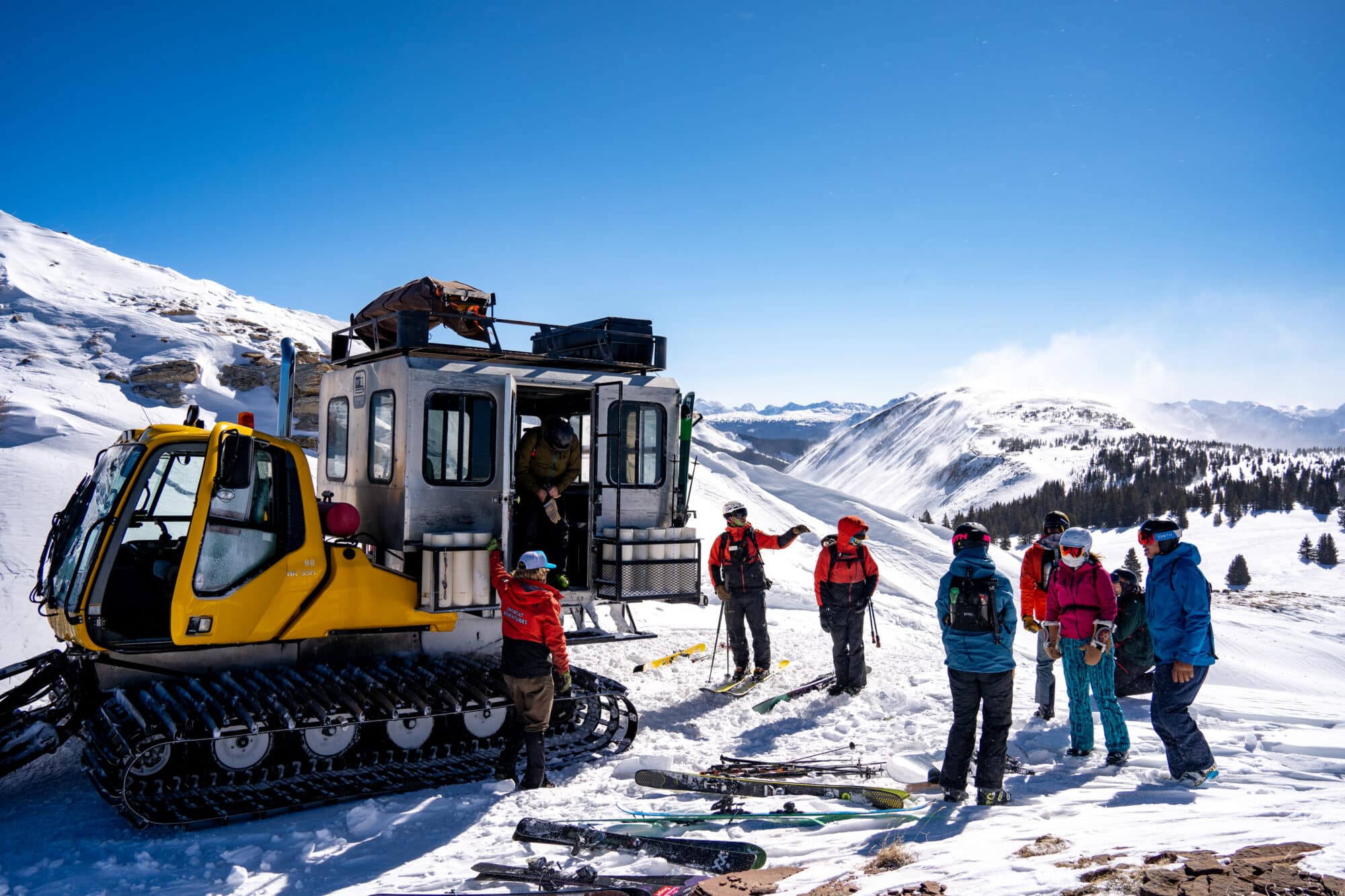 Group unloads the snowcat and prepares for the first decent of the day