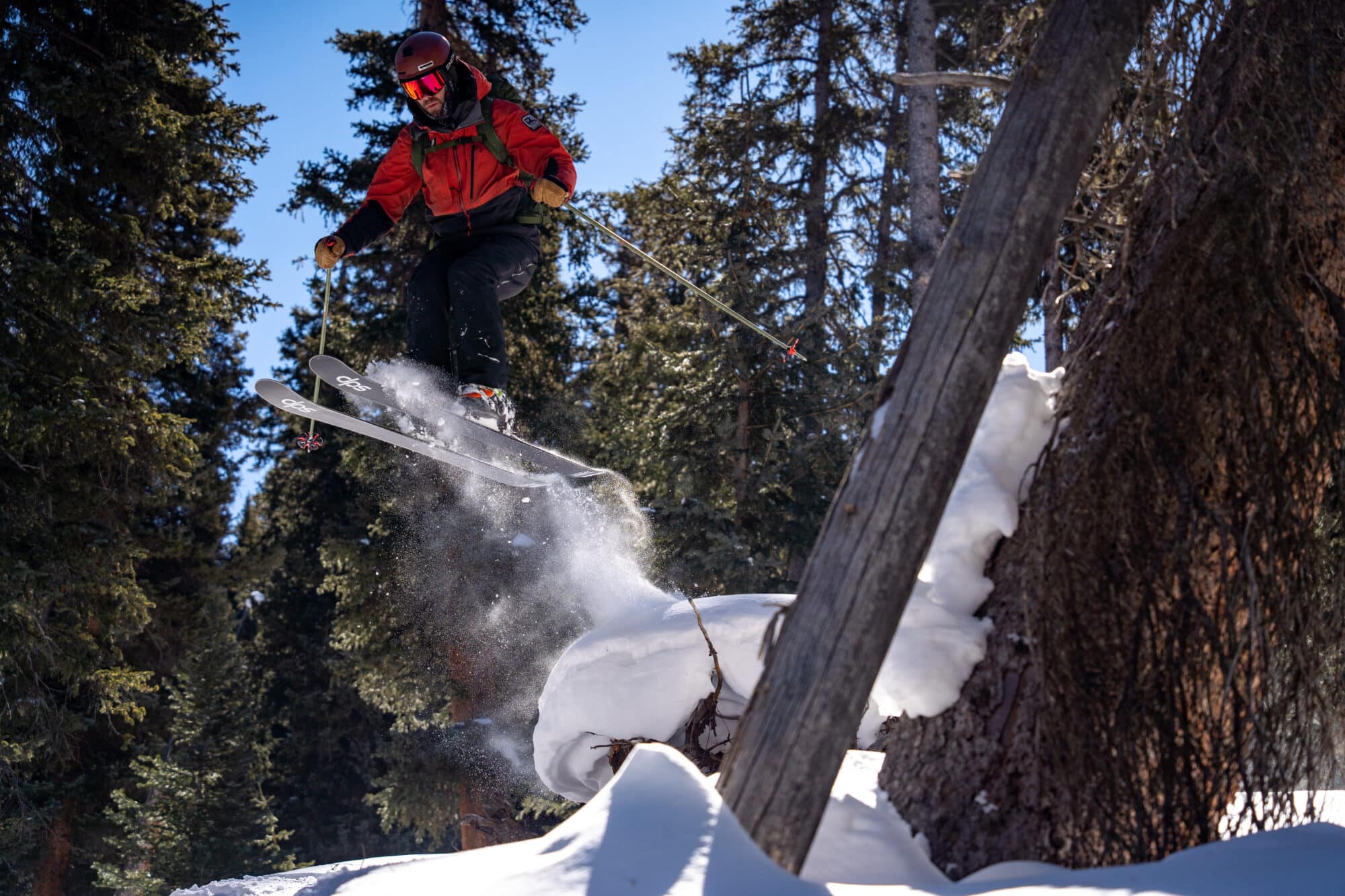 Snowcat guide sends it off a built up pillow of snow