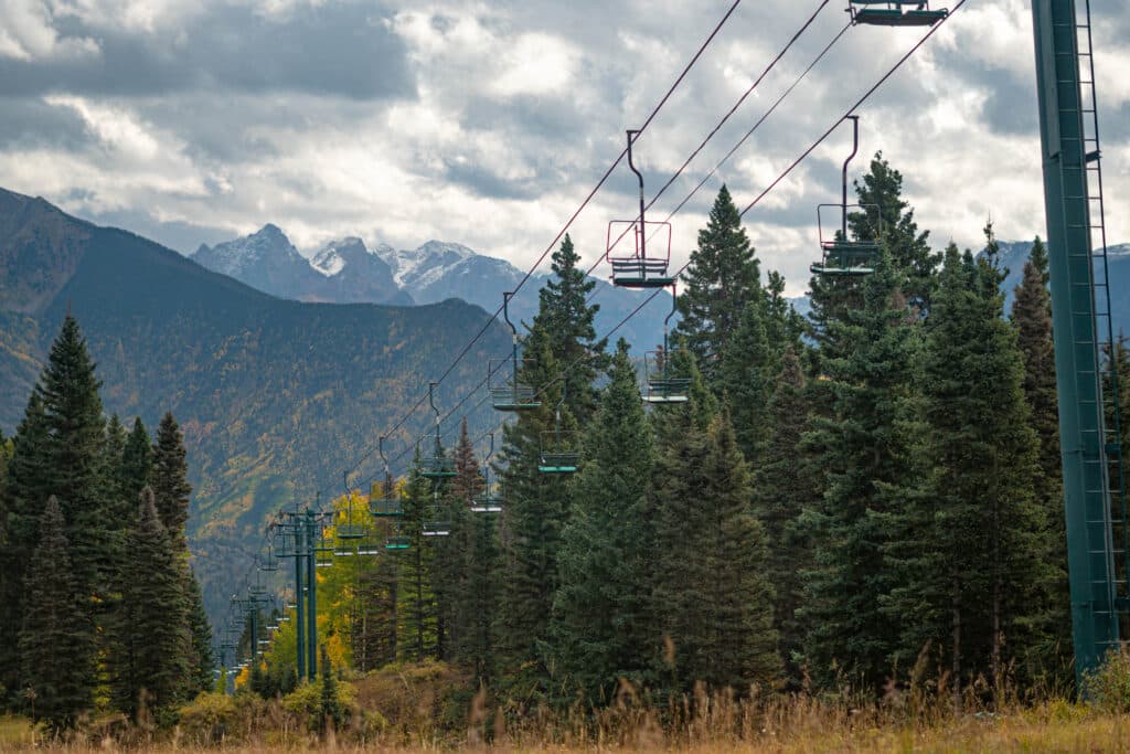 The trees start to change color in early September