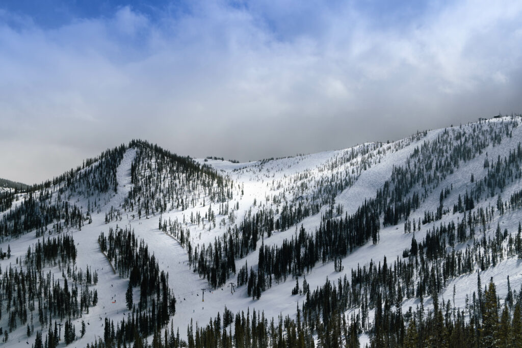 Dramatic sky above a snow covered Monarch Ski Area