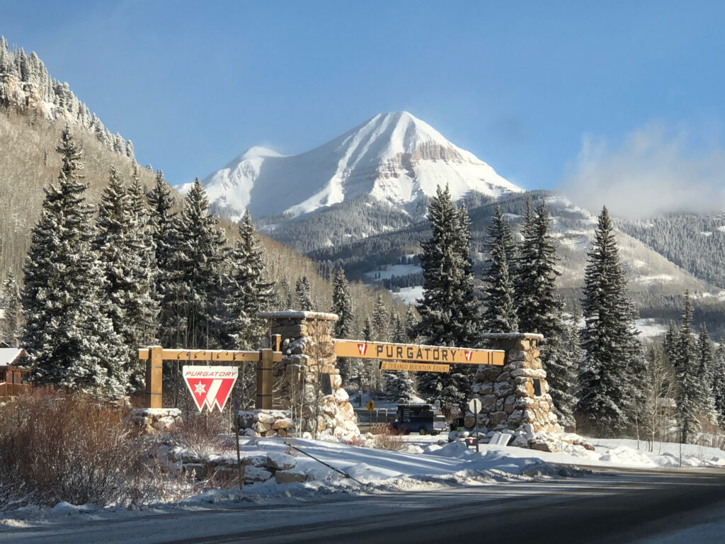 The entrance to Purgatory Resort stands coated in snow