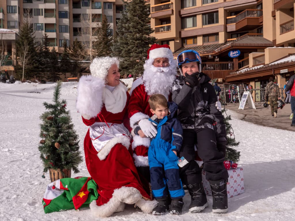 Santa and Mrs. Claus with guest