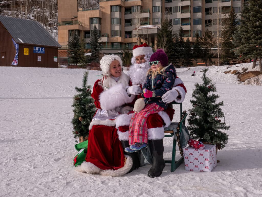 Santa and Mrs. Claus with guest