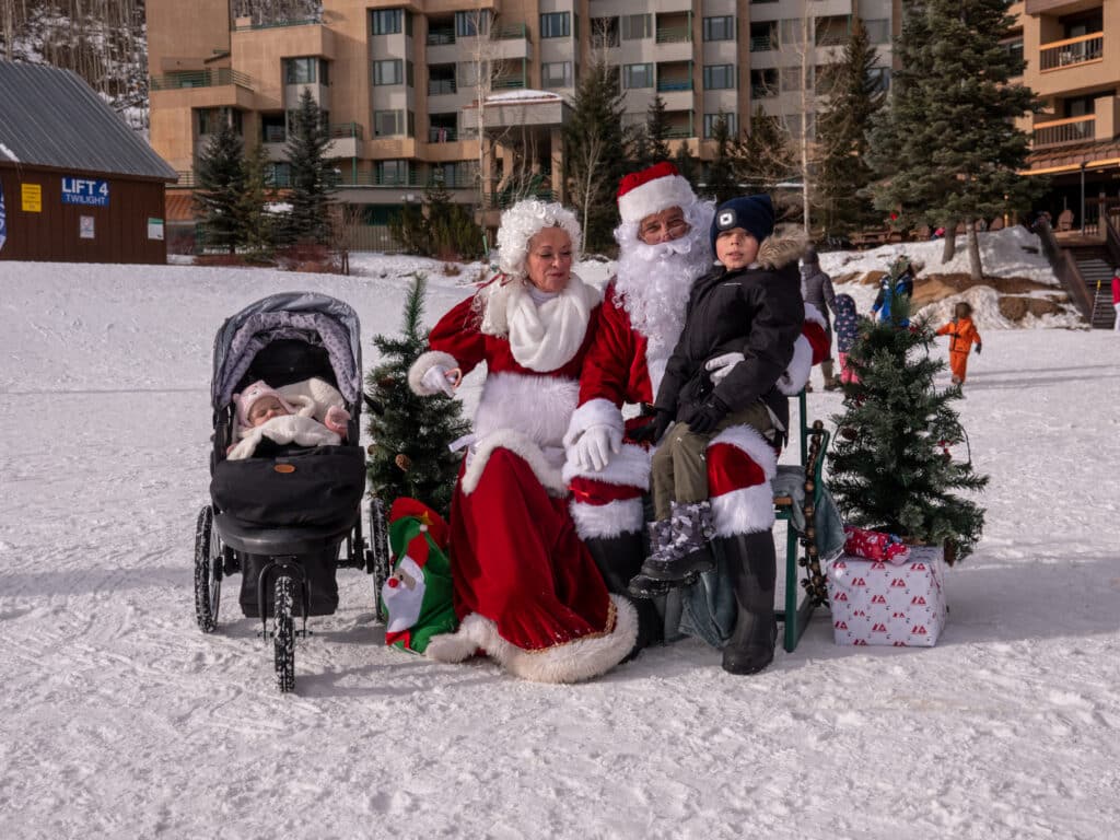 Santa and Mrs. Claus with guest