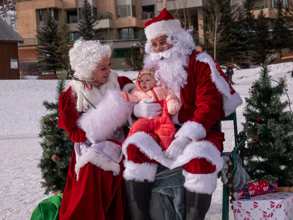 Santa and Mrs. Claus with guest