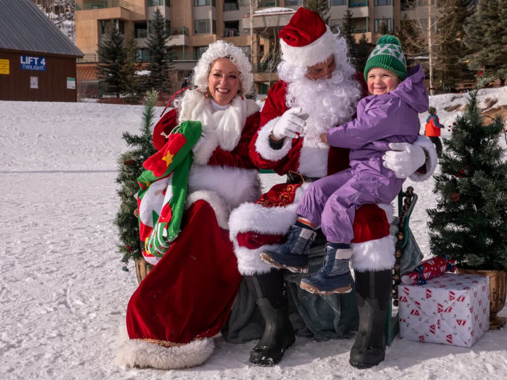 Santa and Mrs. Claus with guest