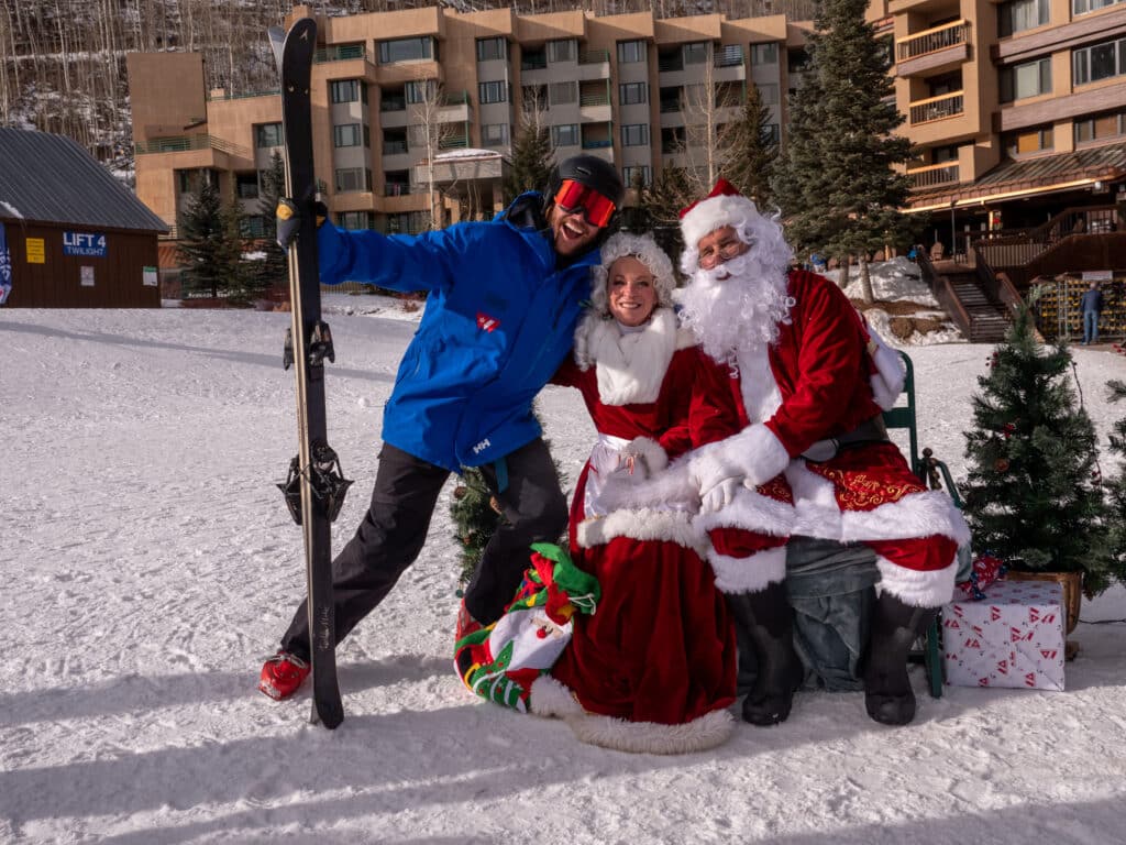 Santa and Mrs. Claus with ski instructor