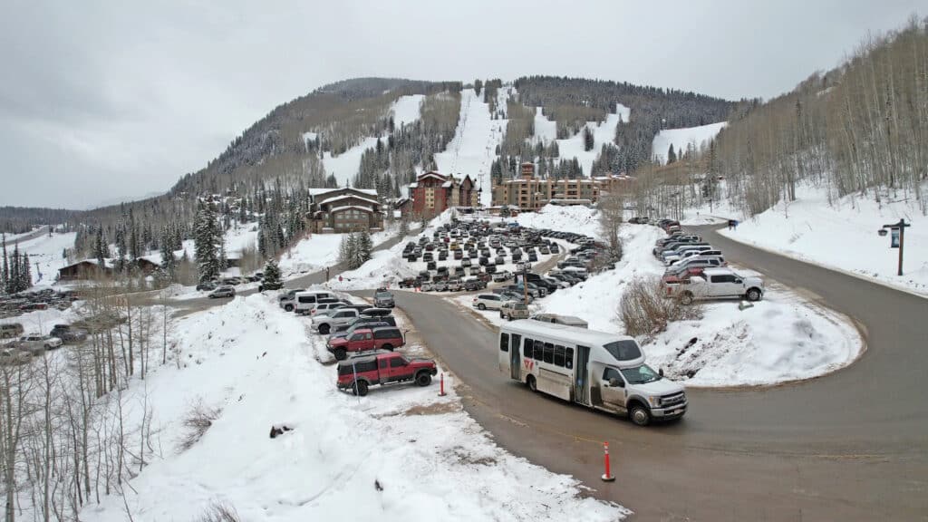 Cars park in the main village lot at purgatory