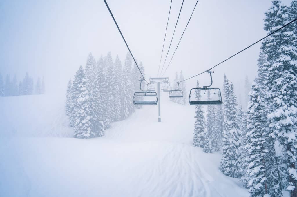 The lift is turning and getting ready to carry skiers and riders up for a powder day