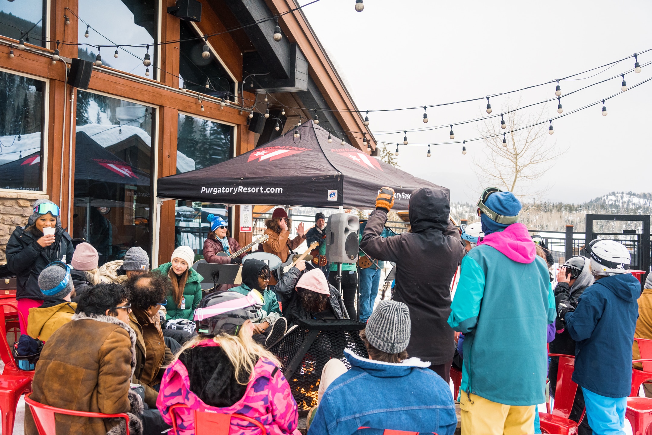 A band plays music on the Purgy's Patio