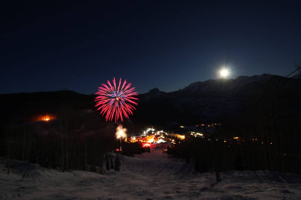 Beautiful night with fireworks at the base area.