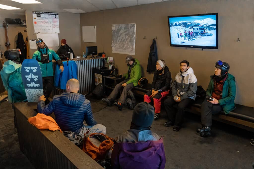 A group preparing for their PSA snowcat tour