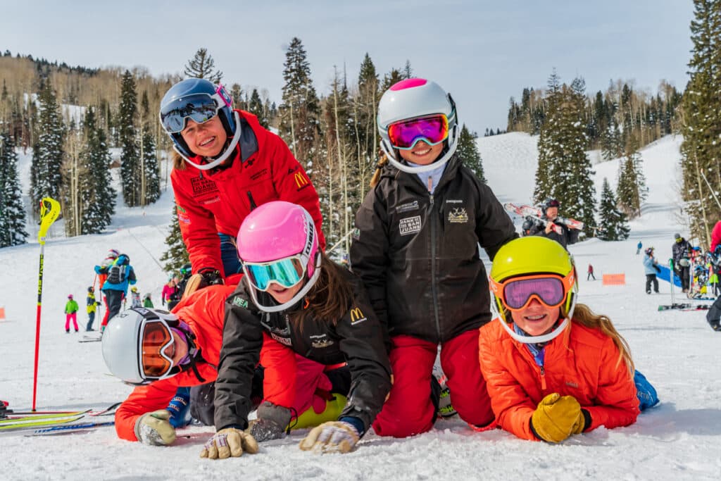 A group of kids posing for photo