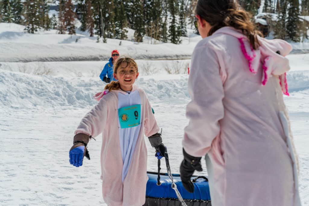 A mom and daughter competing in the Uncle Clyde Race