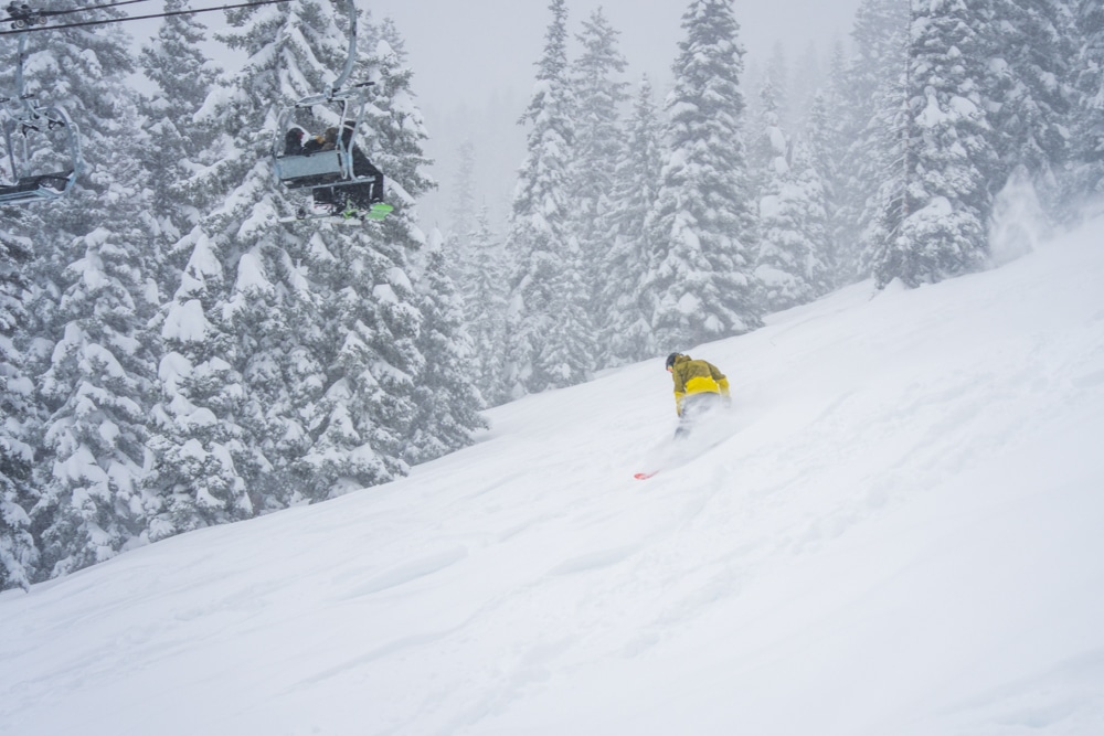 Snowboarder on powder day