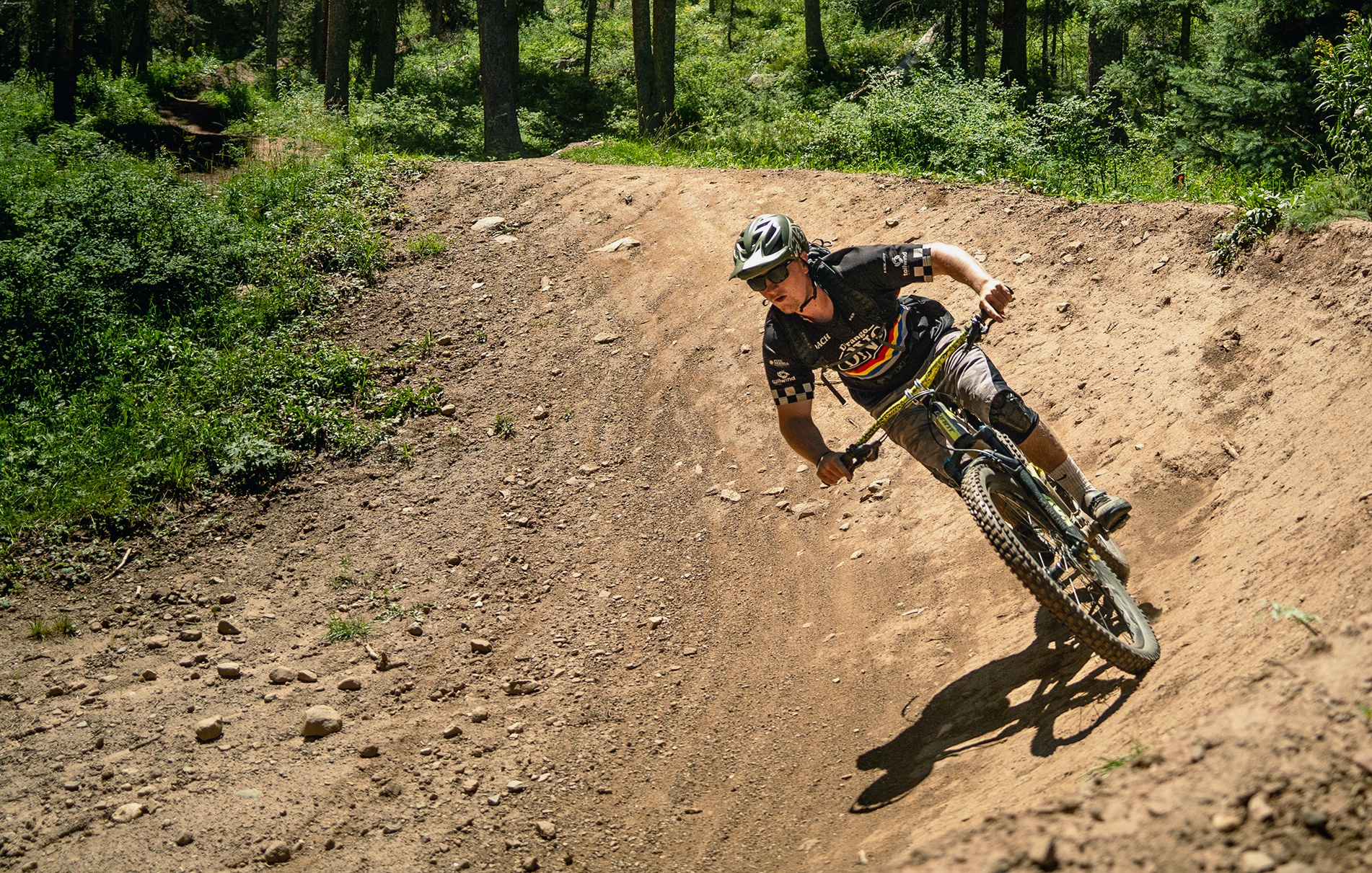 guy riding his bike on a berm