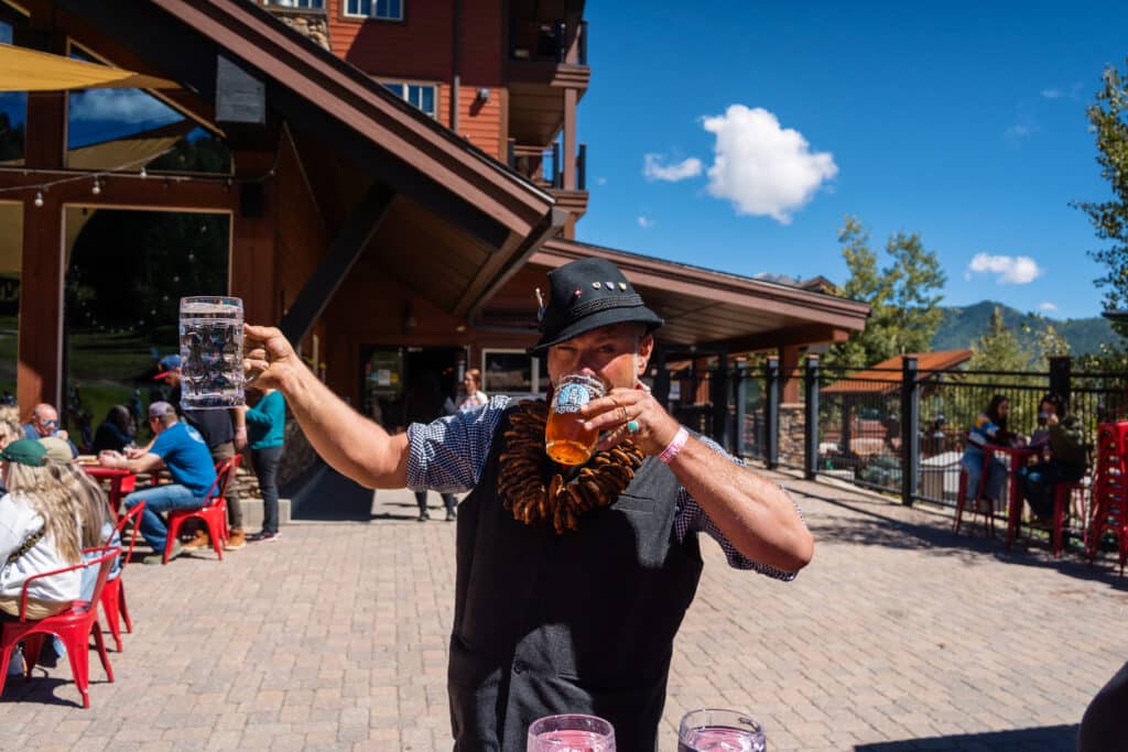 A man drinks beer at Oktoberfest
