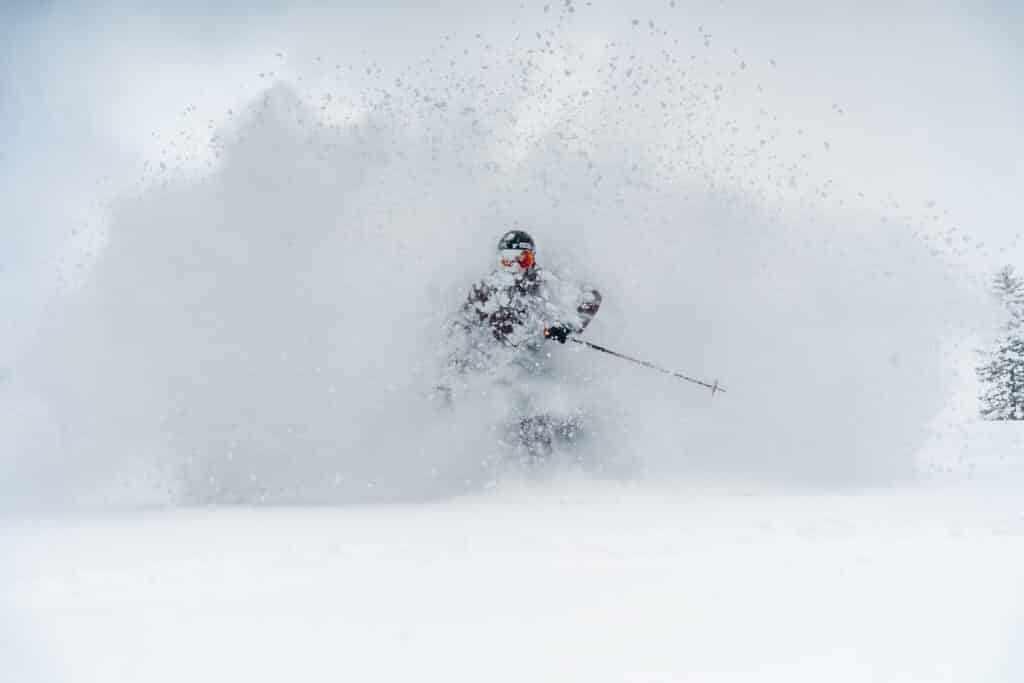 Skier burst through the white room of powder at Purgatory Resort