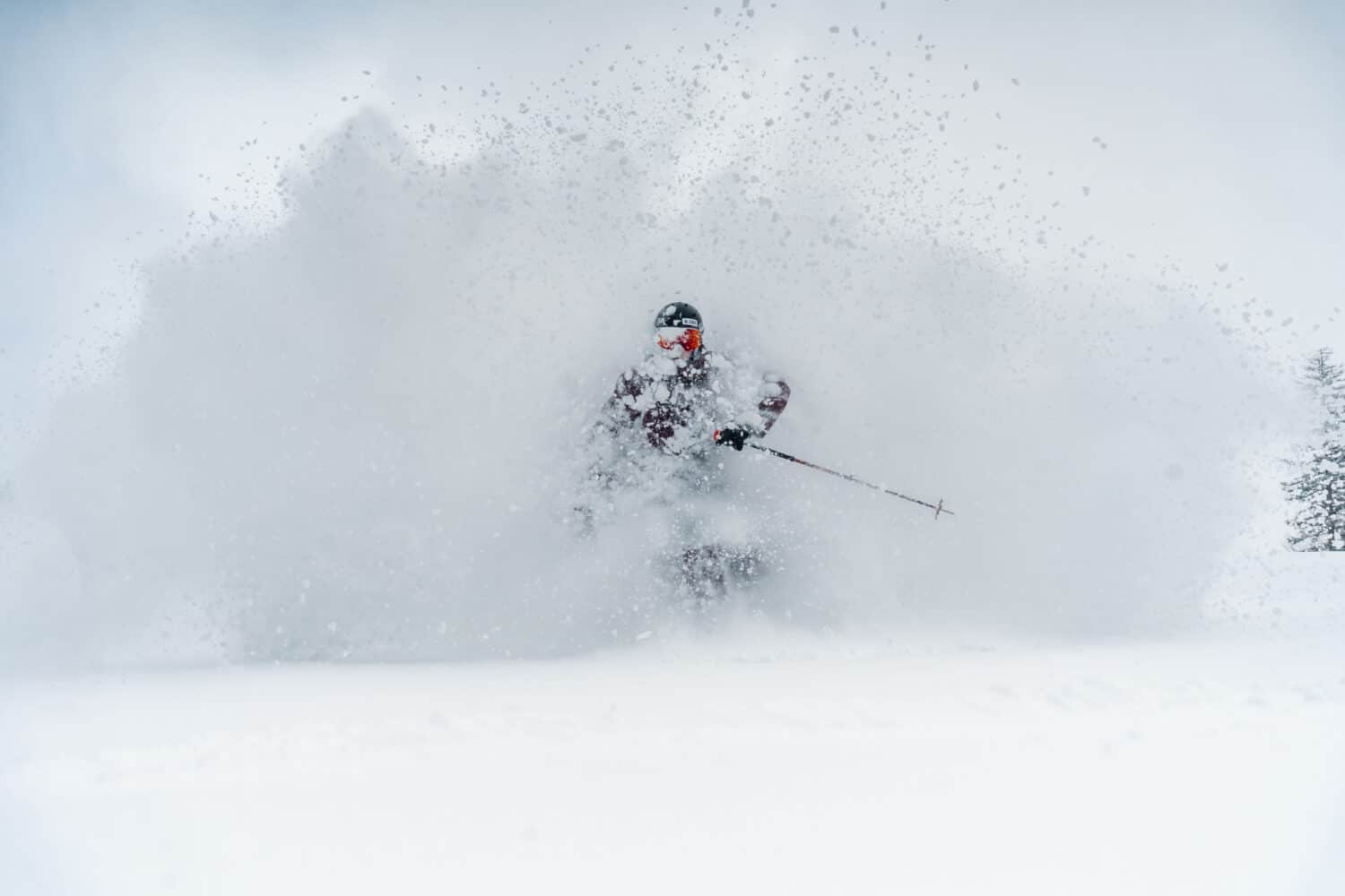 Skier burst through the white room of powder at Purgatory Resort