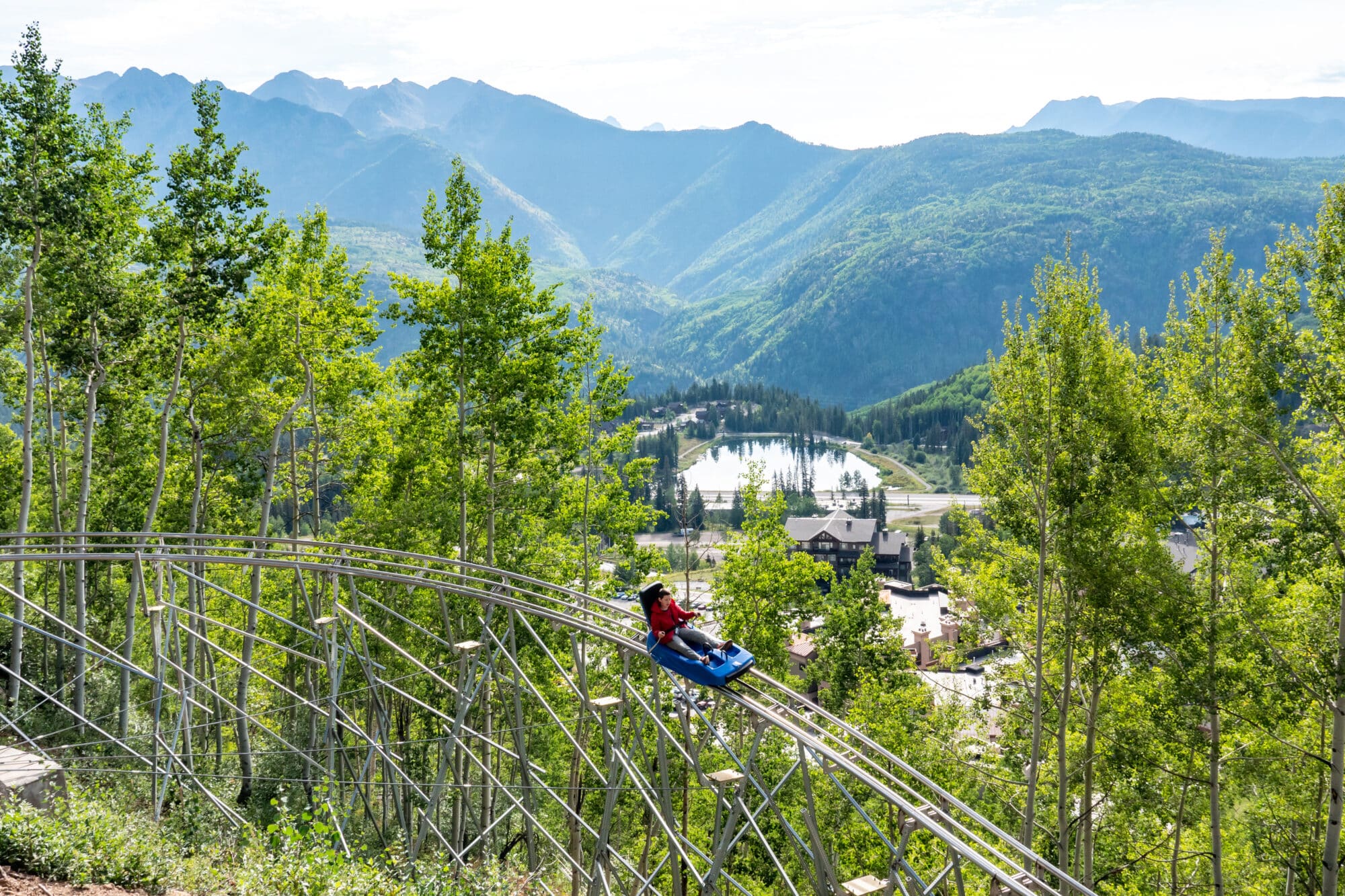 The mountain coaster in summer with mountains in the background