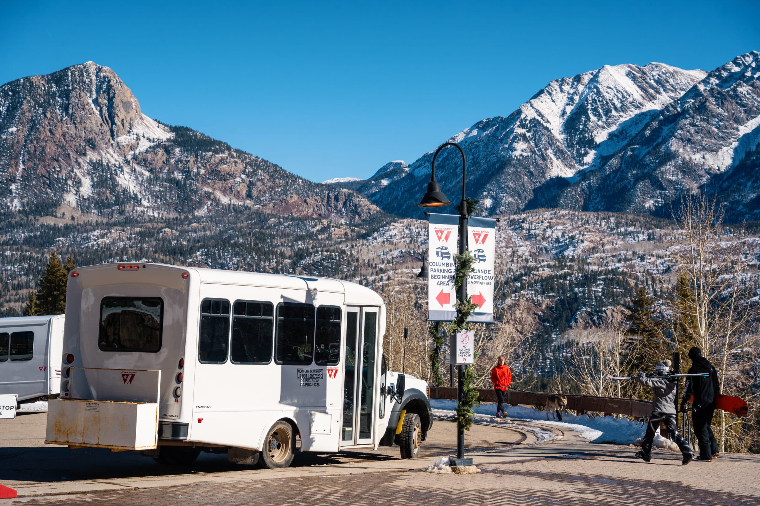 Shuttle waits for skiers in the arrival court