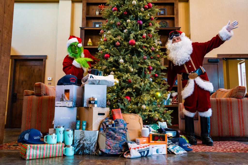 Santa shows of what gifts he brought to spread joy at Purgatory Resort