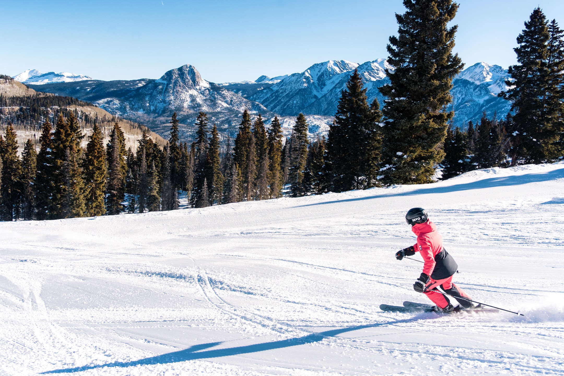 Pink skier shreds down groomer