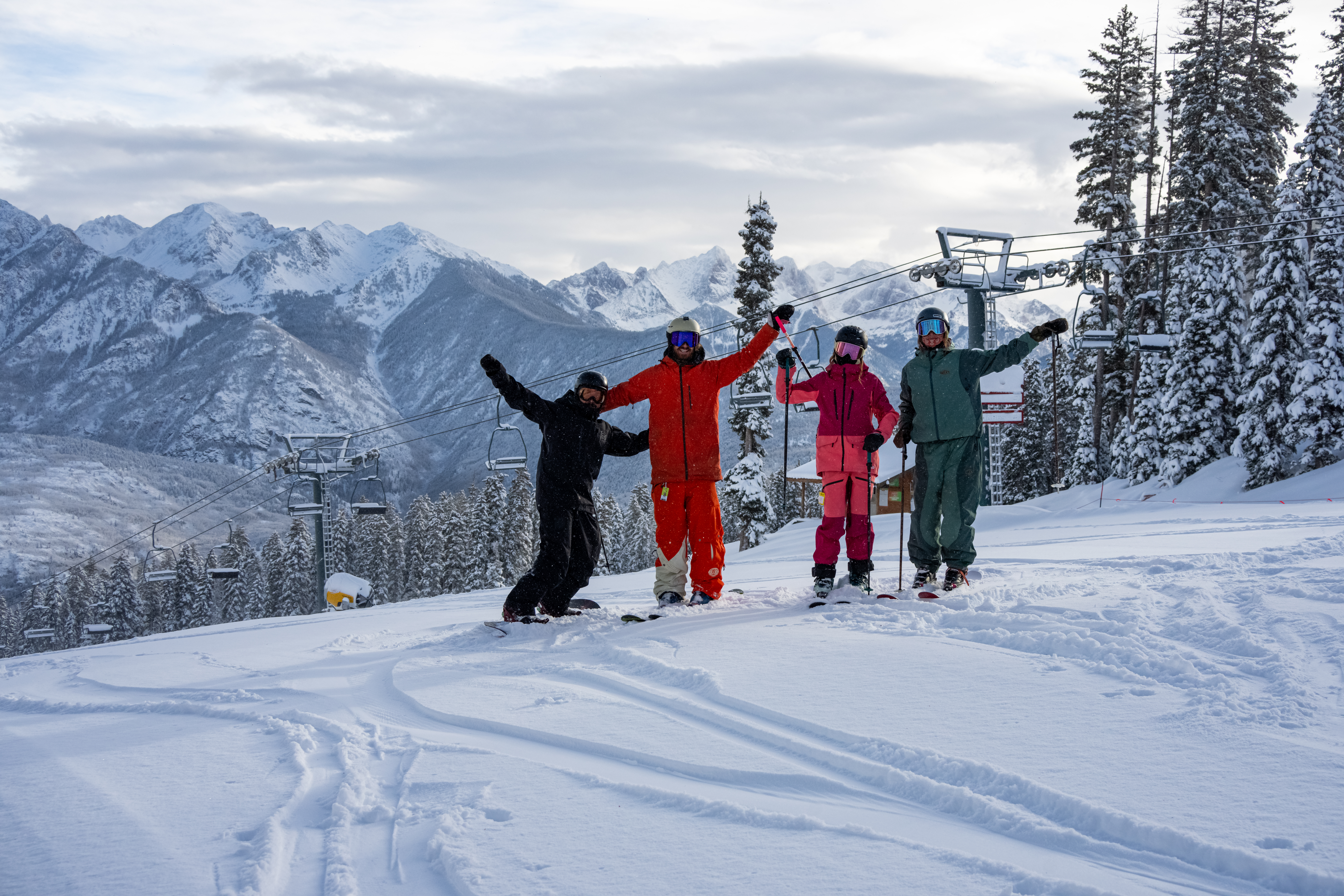 Friends at the top of paradise on a powder day