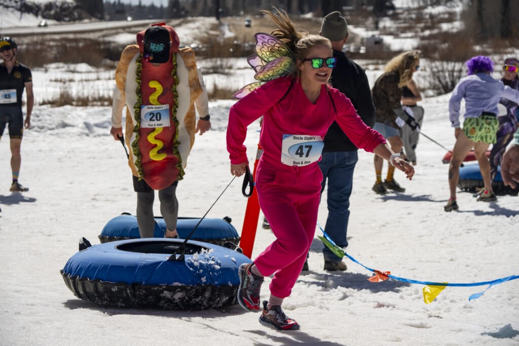 A fairy runs with a tube, followed closely by a hotdog