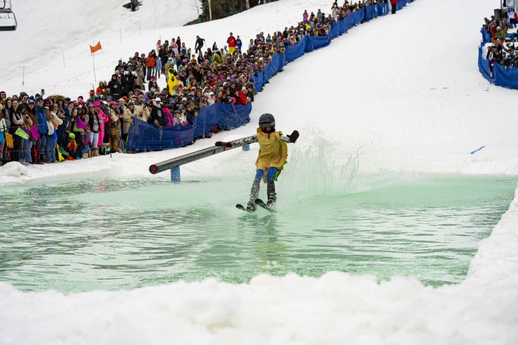 Young skier in taco outfits skims across the pond at Purgatory Resort