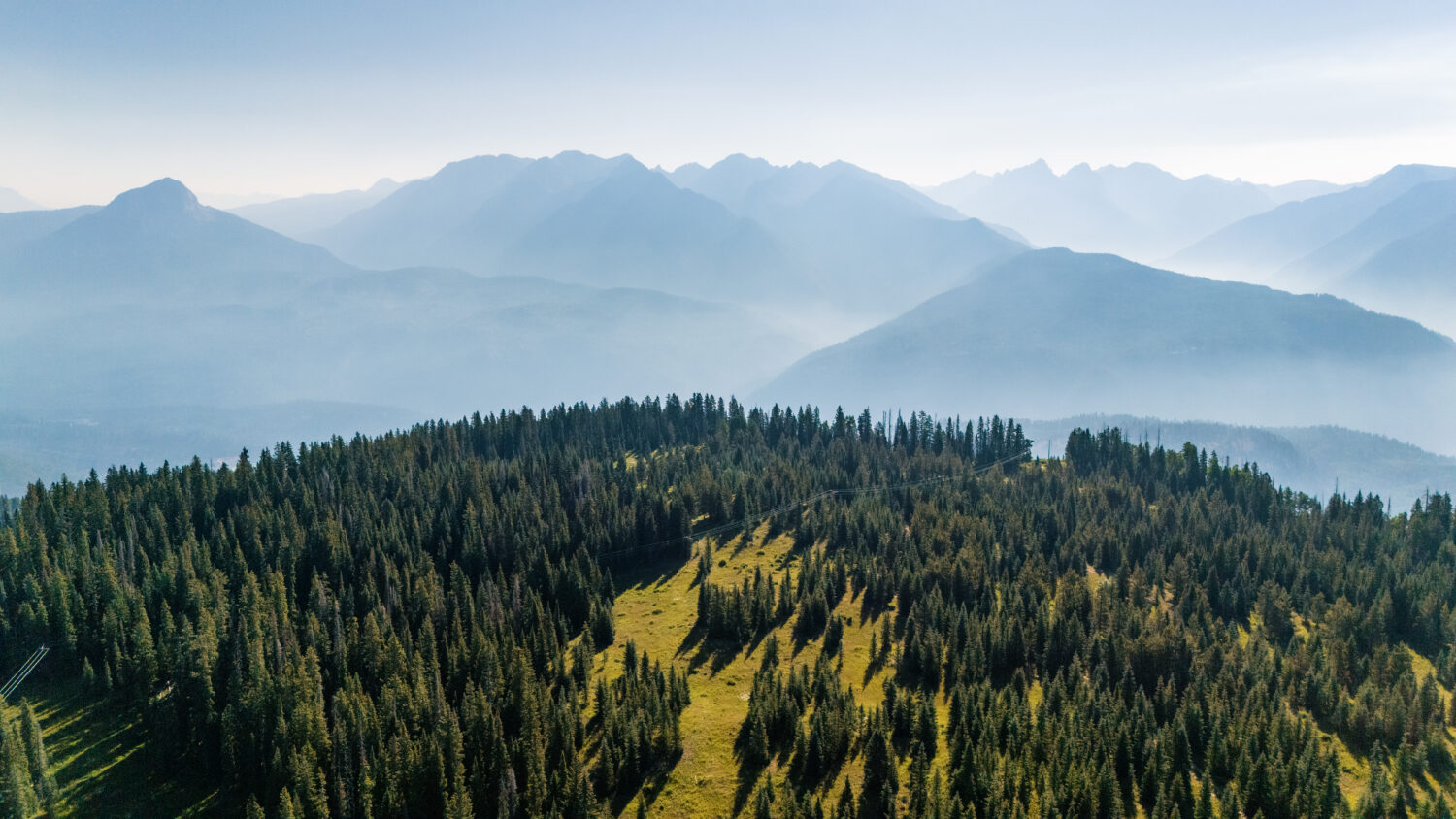 A scenic drone image from Purgatory Resort of wildfire smokes settled in the San Juan Mountains