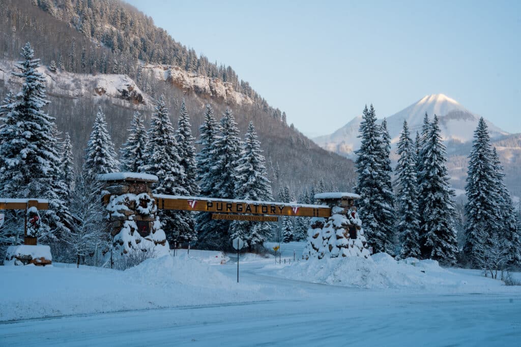Snowy front gate of Purgatory Resort on the Deals and Packages Page