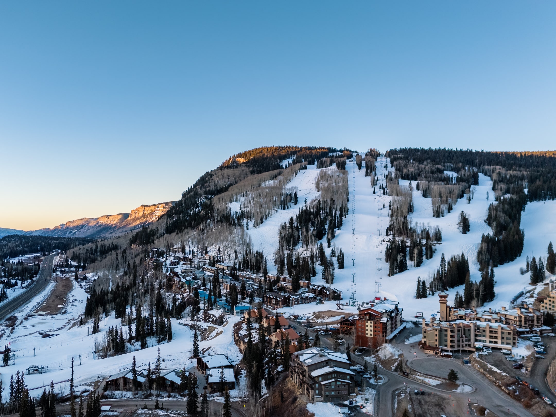 Arial drone view of Purgatory Resort during sunrise in the winter