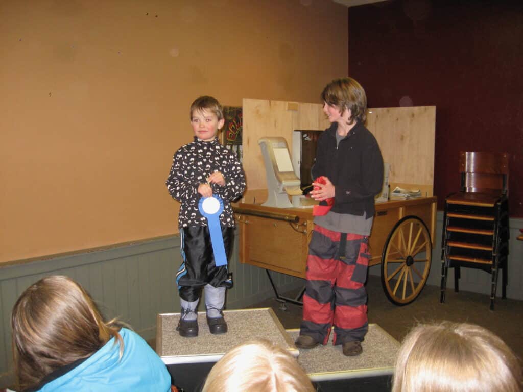 Young Charlie Mickel winning prize